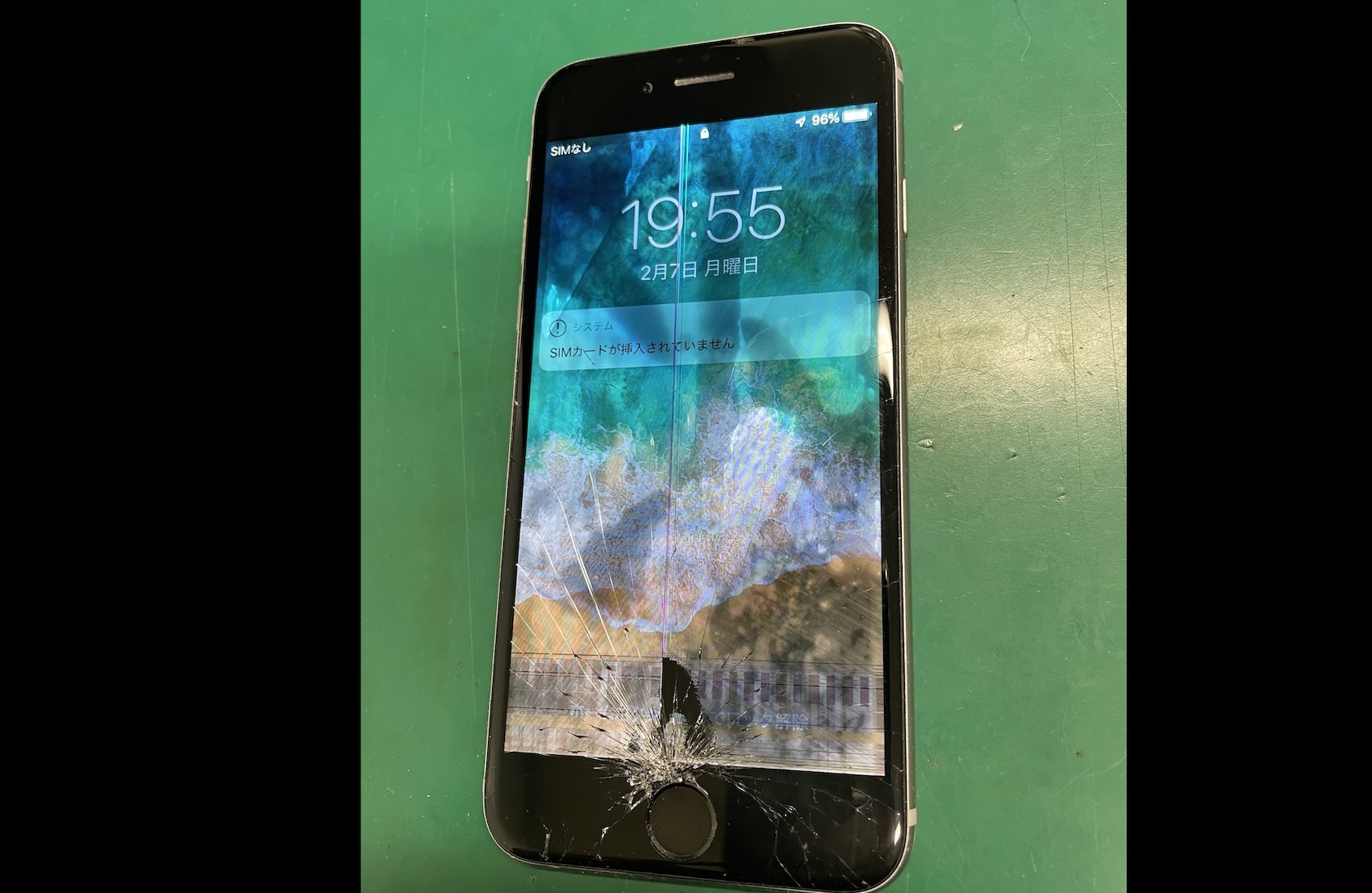 水に濡れたiPhoneの画面表示